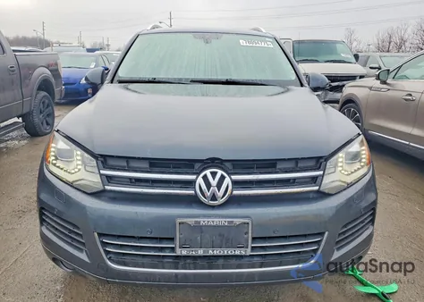 2014 Volkswagen Touareg V6 Tdi z USA, uszkodzony, nr VIN WVGEP9BP6ED003755